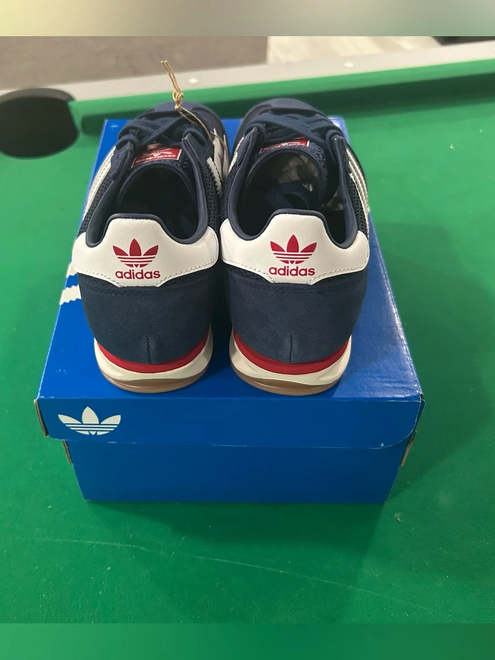 adidas Navy Blue Sneakers with White Stripes and Red Accent